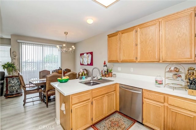 1251 Pepperwood Ct, Carson, CA 90746 - kitchen featuring dishwasher, a peninsula, a chandelier, light wood-style floors, and light countertops