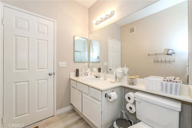 1251 Pepperwood Ct, Carson, CA 90746 - bathroom with vanity and wood finished floors