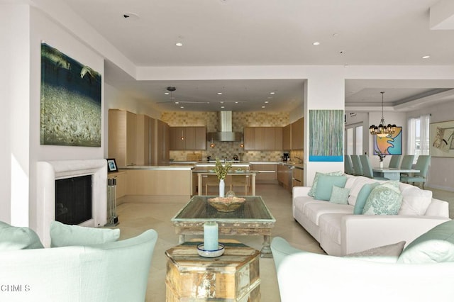 1135 Capri Way, Oxnard, CA 93035 - living area featuring a chandelier, a tray ceiling, and recessed lighting