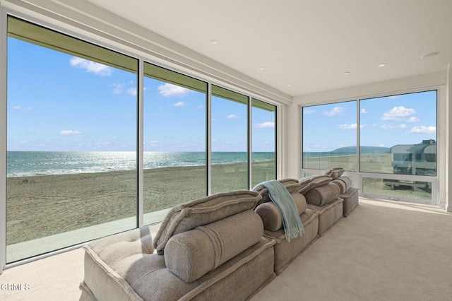 1135 Capri Way, Oxnard, CA 93035 - sunroom with view of water and beach and carpet flooring