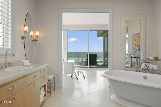 1135 Capri Way, Oxnard, CA 93035 - bathroom featuring vanity, a freestanding tub, and tile patterned flooring
