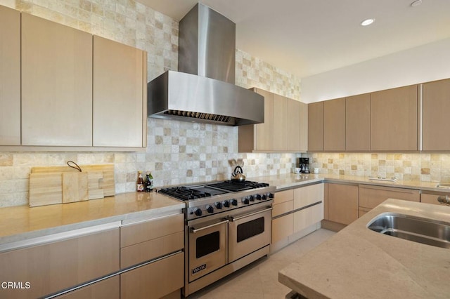 1135 Capri Way, Oxnard, CA 93035 - kitchen featuring wall chimney range hood, double oven range, tasteful backsplash, a sink, and recessed lighting