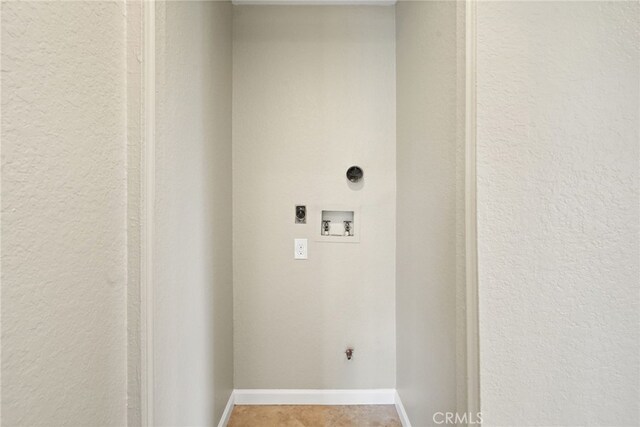 2554 Olive Dr Unit 38, Palmdale, CA 93550 - washroom featuring hookup for an electric dryer, hookup for a washing machine, baseboards, and tile patterned flooring