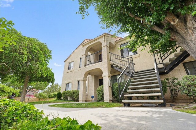 2554 Olive Dr Unit 38, Palmdale, CA 93550 - view of building exterior featuring stairway