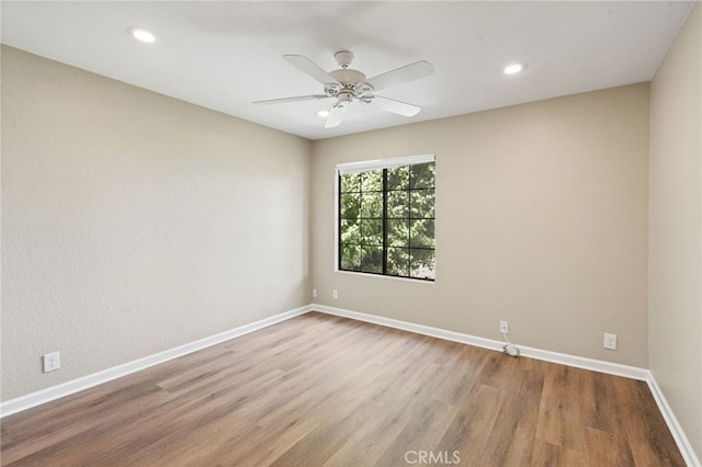 2554 Olive Dr Unit 38, Palmdale, CA 93550 - unfurnished room featuring wood finished floors, ceiling fan, baseboards, and recessed lighting