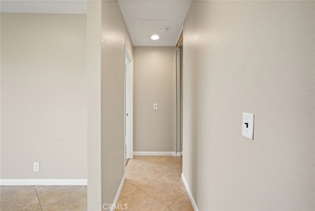 2554 Olive Dr Unit 38, Palmdale, CA 93550 - corridor featuring light tile patterned floors and baseboards