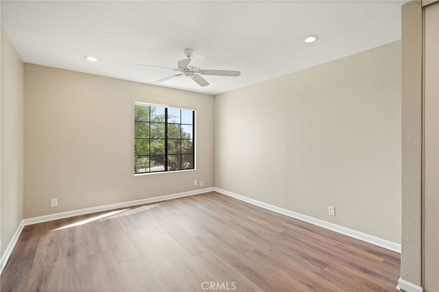 2554 Olive Dr Unit 38, Palmdale, CA 93550 - spare room with wood finished floors, baseboards, ceiling fan, and recessed lighting