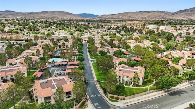 2554 Olive Dr Unit 38, Palmdale, CA 93550 - aerial view of property's location with a mountainous background and nearby suburban area