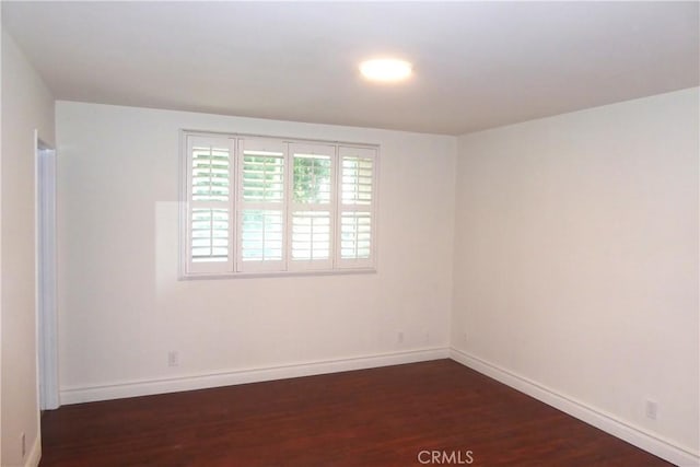 900 W Sierra Madre Ave Unit 184, Azusa, CA 91702 - empty room with dark wood-type flooring and baseboards