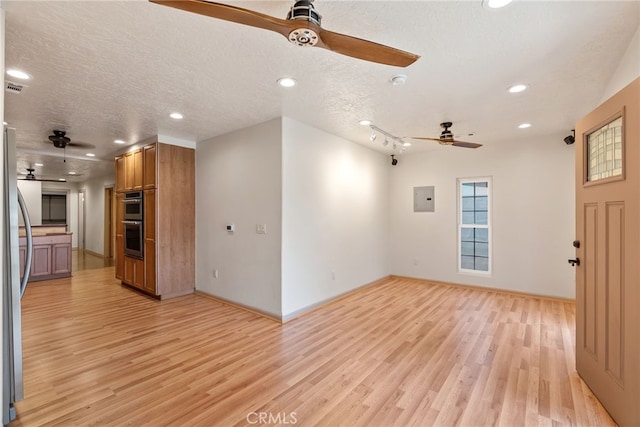 528 W Culver Ave, Orange, CA 92868 - unfurnished living room with ceiling fan, electric panel, light wood-type flooring, baseboards, and recessed lighting