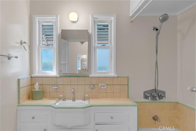 11046 Howard St, Whittier, CA 90606 - full bathroom with vanity, a bath, and backsplash