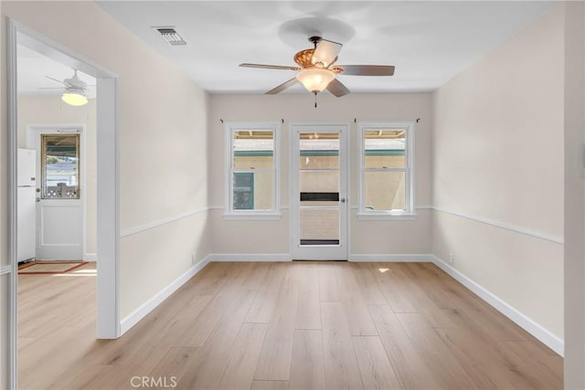 11046 Howard St, Whittier, CA 90606 - foyer entrance featuring a ceiling fan and light wood-style floors