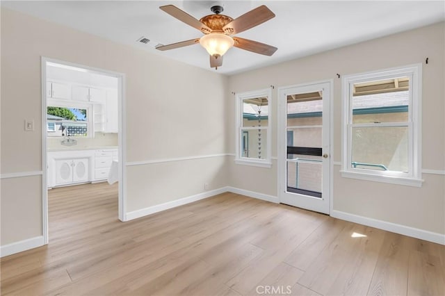 11046 Howard St, Whittier, CA 90606 - spare room with light wood-type flooring, ceiling fan, and plenty of natural light