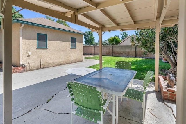 11046 Howard St, Whittier, CA 90606 - fenced backyard with a patio and outdoor dining space