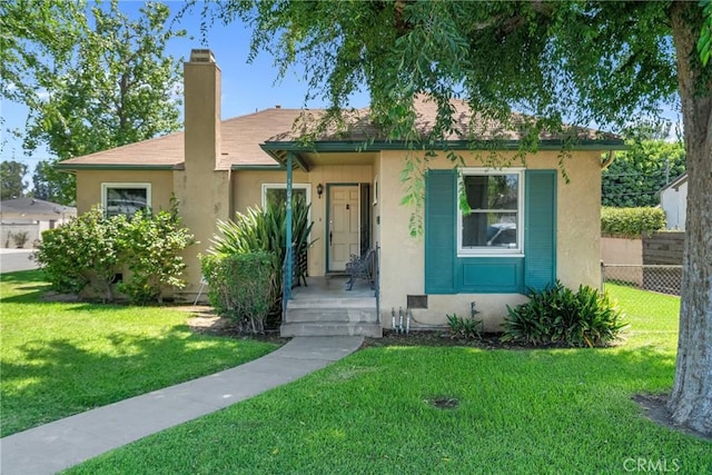 11046 Howard St, Whittier, CA 90606 - bungalow-style house featuring stucco siding, a chimney, and roof with shingles
