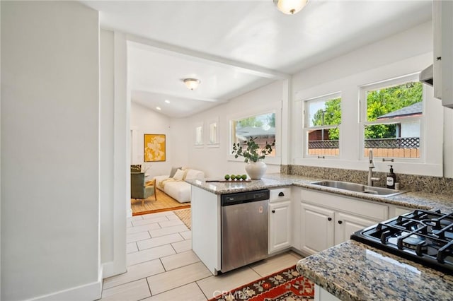 1241 Bresee Ave, Pasadena, CA 91104 - kitchen with stainless steel dishwasher, a sink, white cabinets, a peninsula, and open floor plan