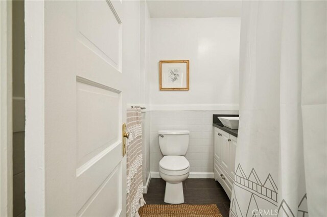 1241 Bresee Ave, Pasadena, CA 91104 - bathroom with vanity, wainscoting, and tile walls