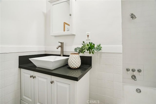 1241 Bresee Ave, Pasadena, CA 91104 - bathroom with tile walls, vanity, and a tub to relax in