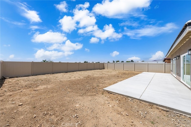 1239 Ansley Ln, Mentone, CA 92359 - fenced backyard with a patio