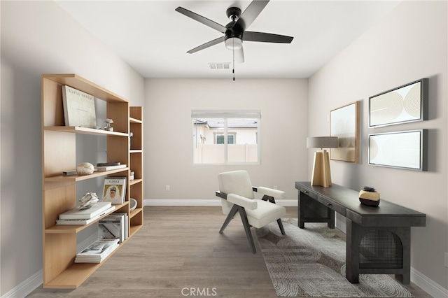 1239 Ansley Ln, Mentone, CA 92359 - office space featuring wood finished floors and a ceiling fan