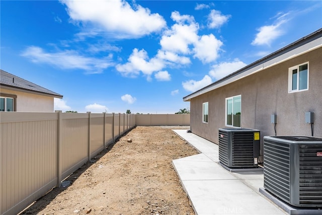 1239 Ansley Ln, Mentone, CA 92359 - fenced backyard featuring a patio area