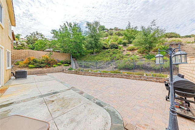 25238 Gloriso Ln, Stevenson Ranch, CA 91381 - fenced backyard with a patio and central AC unit