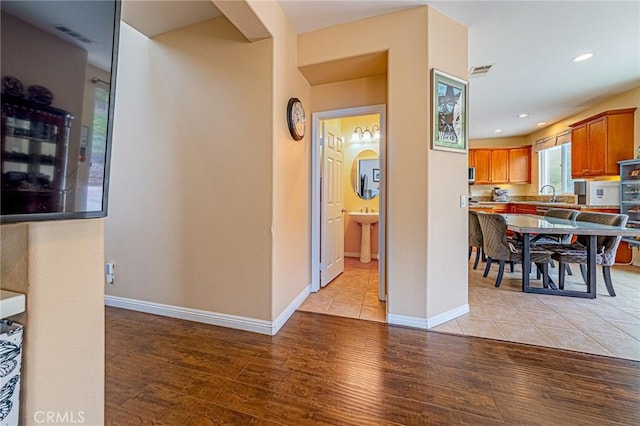 25238 Gloriso Ln, Stevenson Ranch, CA 91381 - dining room with light wood-style flooring, baseboards, and recessed lighting