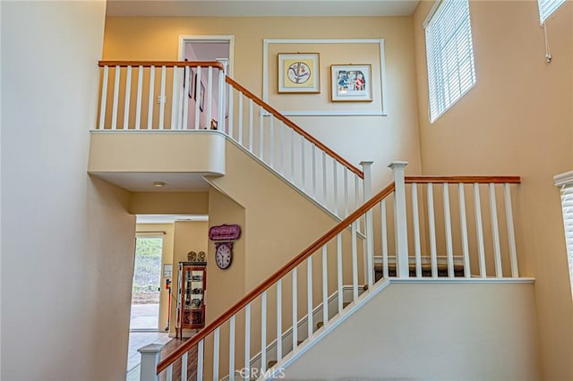 25238 Gloriso Ln, Stevenson Ranch, CA 91381 - stairs featuring a high ceiling