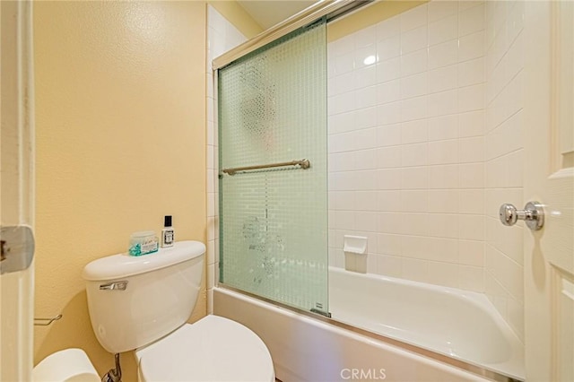 25238 Gloriso Ln, Stevenson Ranch, CA 91381 - bathroom with toilet, enclosed tub / shower combo, and a textured wall