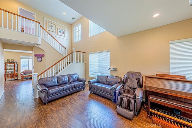 25238 Gloriso Ln, Stevenson Ranch, CA 91381 - living area with stairway, wood finished floors, recessed lighting, and a towering ceiling