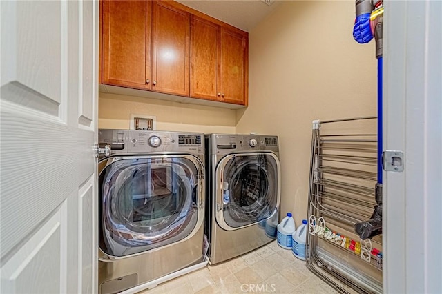 25238 Gloriso Ln, Stevenson Ranch, CA 91381 - washroom with cabinet space, independent washer and dryer, and tile patterned floors