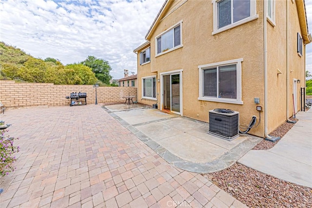 25238 Gloriso Ln, Stevenson Ranch, CA 91381 - fenced backyard with cooling unit and a patio area