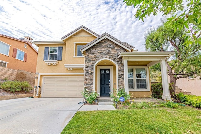 25238 Gloriso Ln, Stevenson Ranch, CA 91381 - view of front facade featuring stucco siding, driveway, a garage, stone siding, and a front lawn