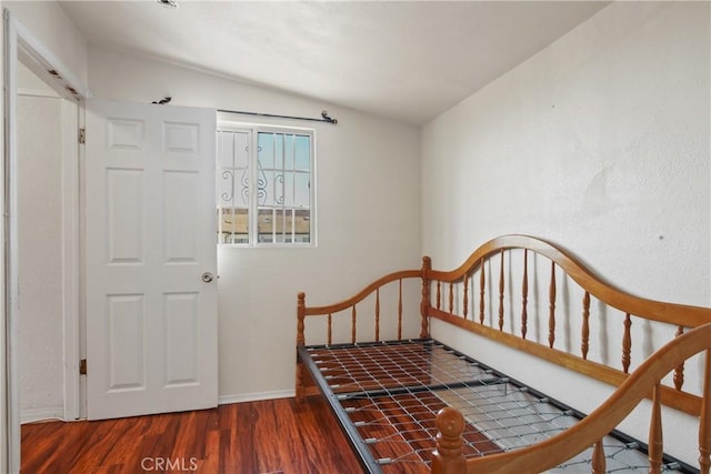 1419 S Redondo Blvd, Los Angeles, CA 90019 - bedroom with wood finished floors, lofted ceiling, and baseboards