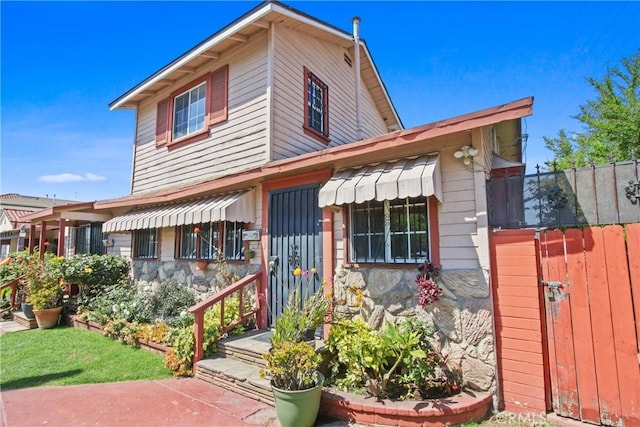 1419 S Redondo Blvd, Los Angeles, CA 90019 - view of front facade featuring stone siding