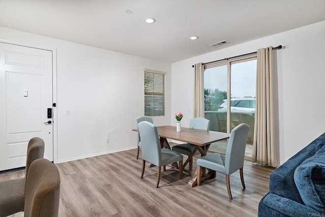 1923 Corte Zafiro Unit 170, Chula Vista, CA 91913 - dining area featuring light wood-style floors, recessed lighting, and baseboards