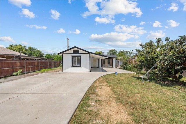 24576 4th St, San Bernardino, CA 92410 - back of property with driveway