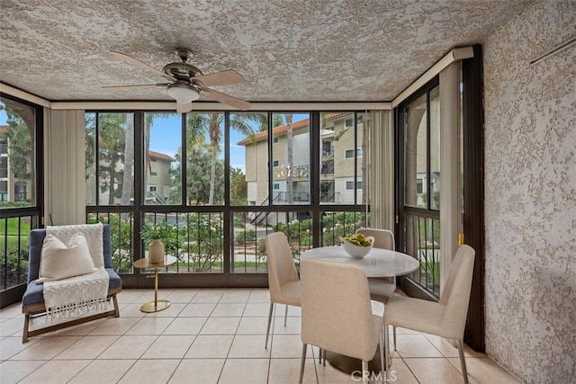 3241 San Amadeo Unit 1G, Laguna Woods, CA 92637 - sunroom featuring a wall of windows, tile patterned floors, and plenty of natural light