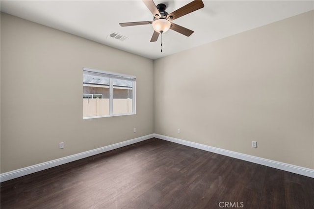 1243 Ansley Ln, Mentone, CA 92359 - spare room with a ceiling fan and dark wood-type flooring