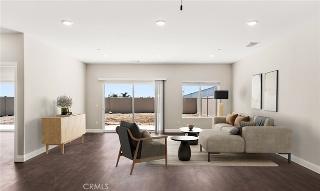 1243 Ansley Ln, Mentone, CA 92359 - living area with dark wood-type flooring and recessed lighting