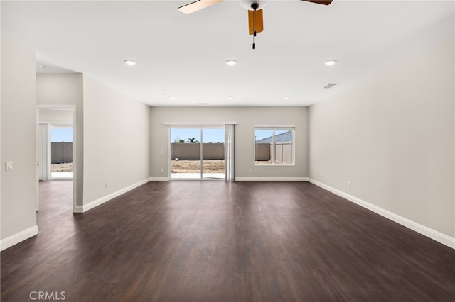 1243 Ansley Ln, Mentone, CA 92359 - unfurnished room featuring a ceiling fan, dark wood-style flooring, and recessed lighting