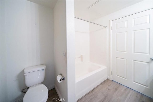 31241 Taylor Ln, Temecula, CA 92592 - full bathroom featuring wood finished floors, toilet, and shower / washtub combination