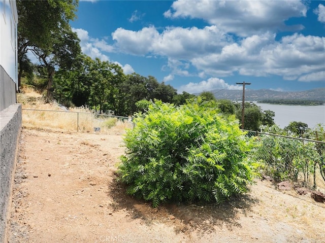 11579 Widgeon Way, Clearlake Oaks, CA 95423 - view of yard with a water view