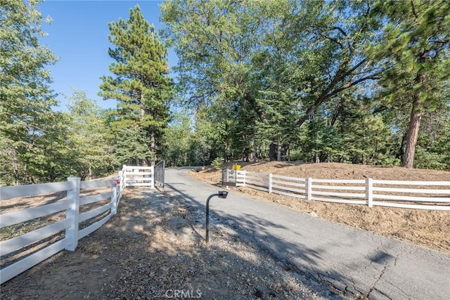 32557 Pine Cone Ct Unit A & B, Running Springs, CA 92382 - view of road featuring a view of trees