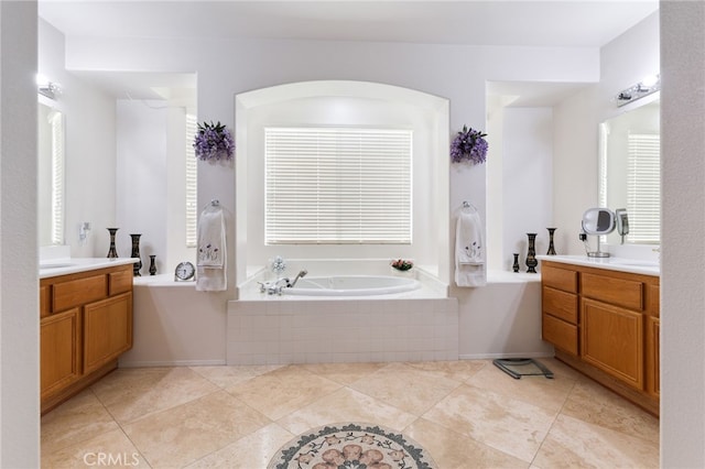 12830 Wildflower Ln, Riverside, CA 92503 - full bathroom featuring two vanities, tile patterned flooring, and a garden tub