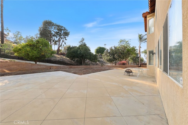 12830 Wildflower Ln, Riverside, CA 92503 - view of patio / terrace with a fire pit