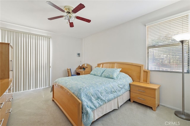 12830 Wildflower Ln, Riverside, CA 92503 - bedroom with light colored carpet, ceiling fan, and baseboards