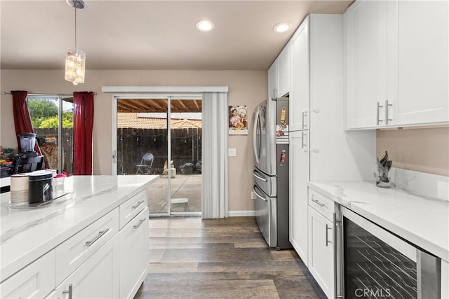 1149 Cochise Ct, Vista, CA 92084 - kitchen featuring wine cooler, freestanding refrigerator, recessed lighting, white cabinets, and dark wood-type flooring