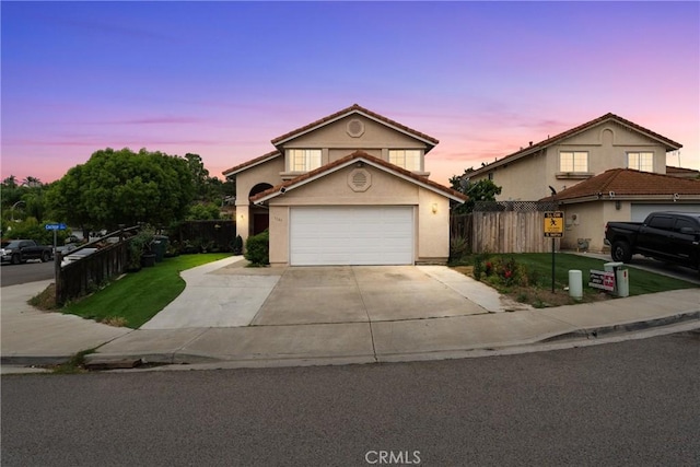 1149 Cochise Ct, Vista, CA 92084 - traditional-style house with driveway, a garage, stucco siding, and a tiled roof