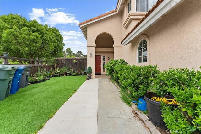 1149 Cochise Ct, Vista, CA 92084 - property entrance with stucco siding and a tile roof